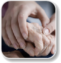 Image of holding a elder persons hand for caregiving